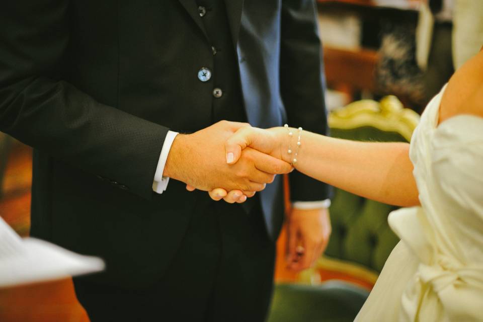 Hands bride and groom