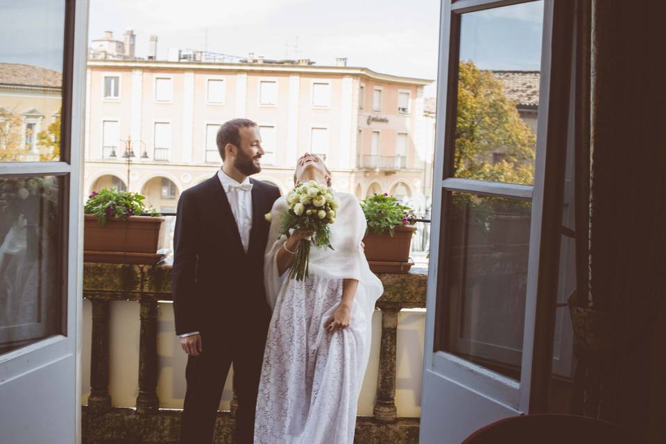 Groom and bride smiling