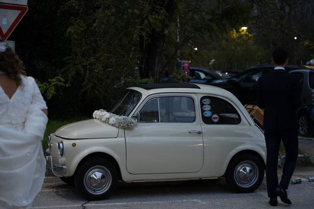 500L con corona di fiori