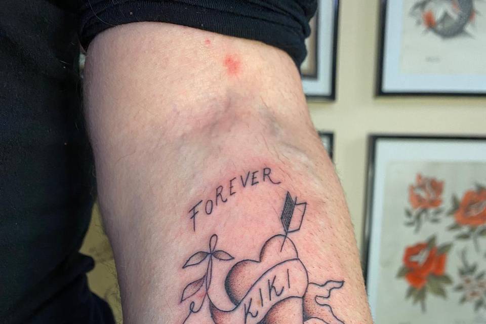 Cuore con dedica tattoo