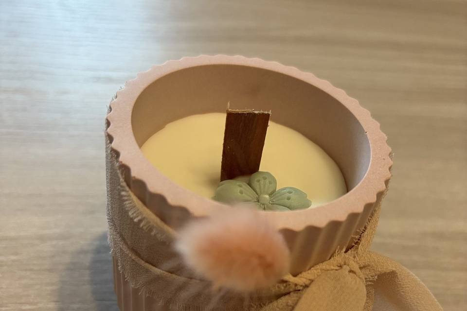 Candela in contenitore