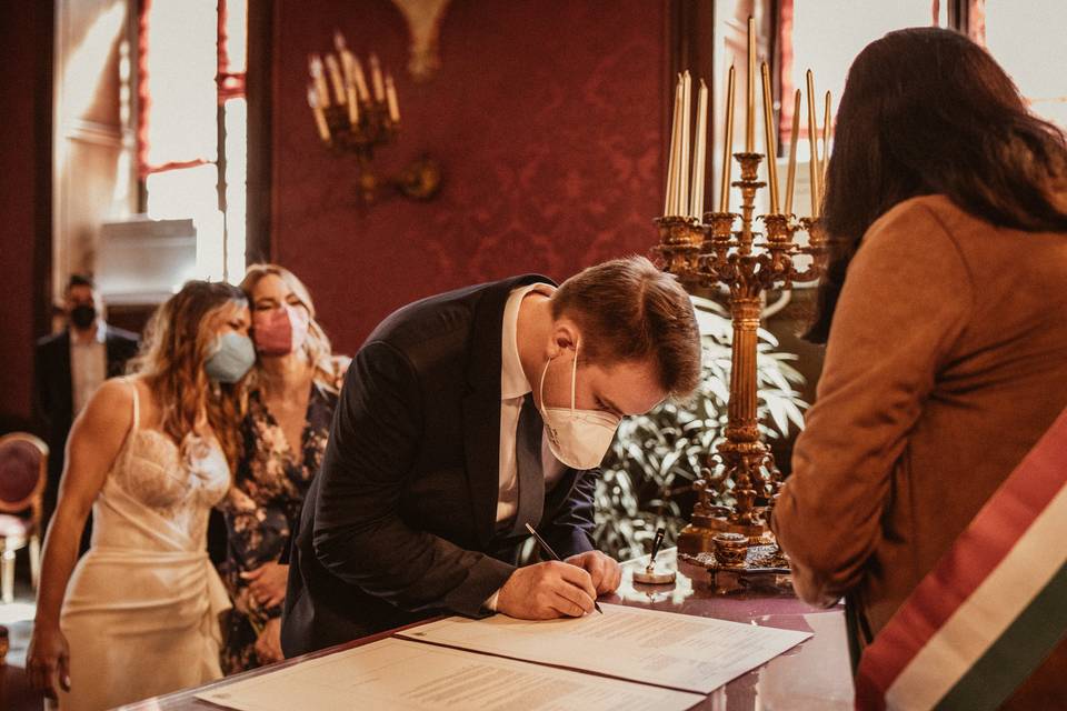 Groom signing