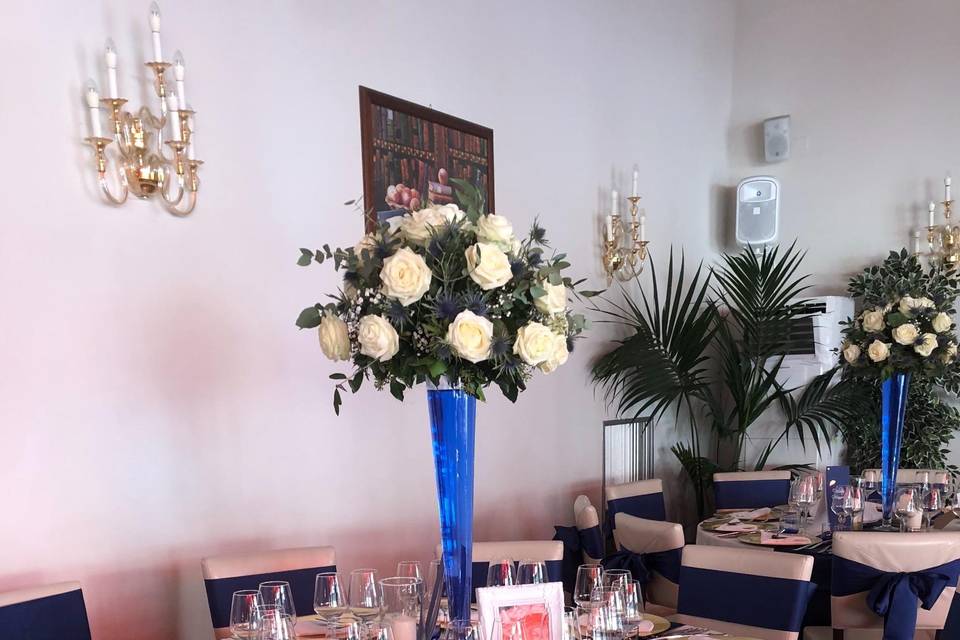 Candelabro con fiori