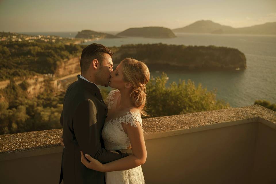 Bride, groom and sunset