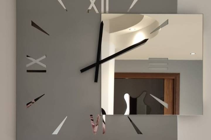 Orologio di design specchiato