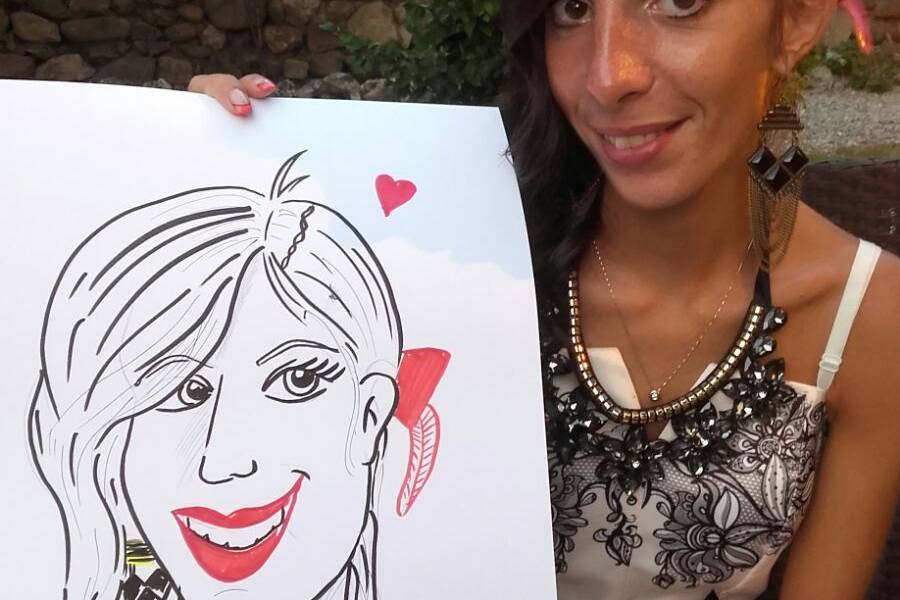 Emy con la sua caricatura