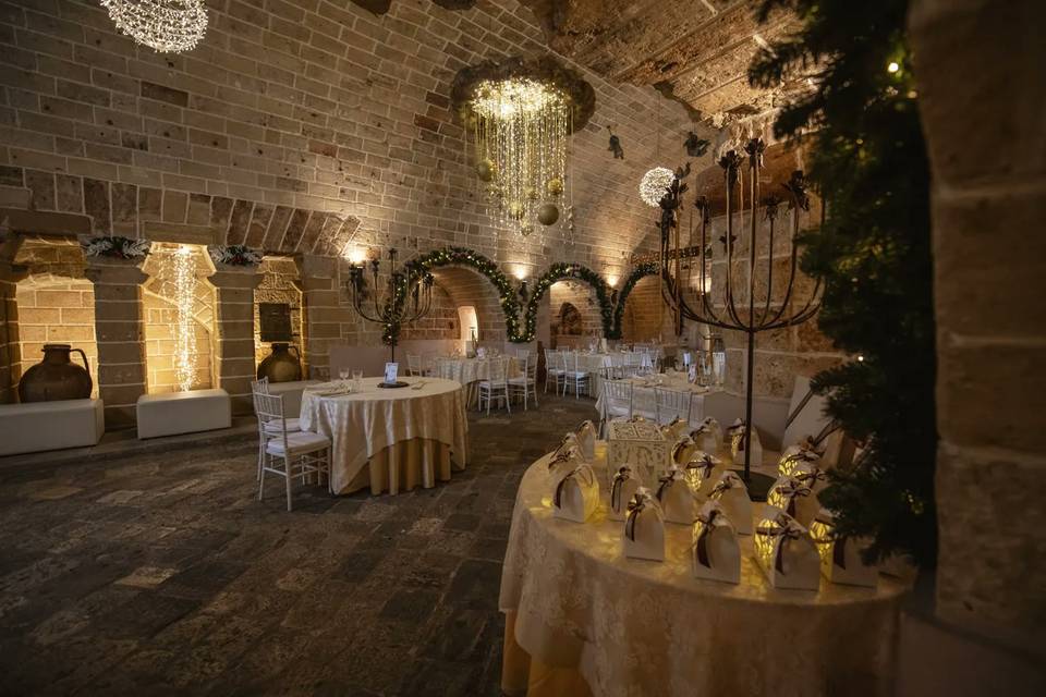 Il tavolo delle bomboniere accanto all'arco