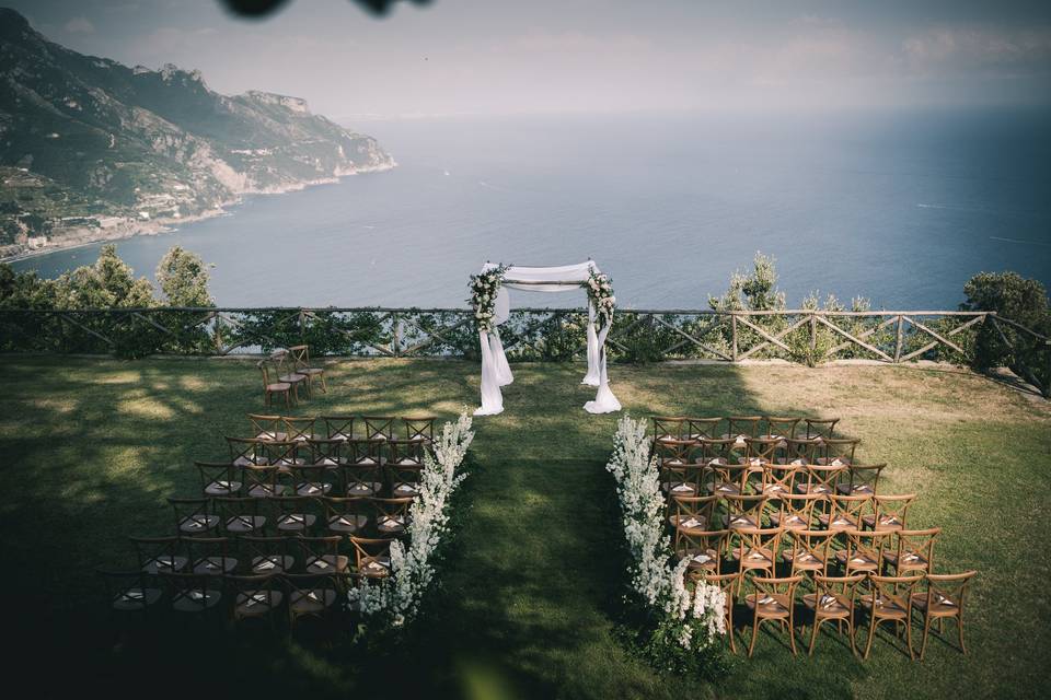 Ceremony with wooden chairs