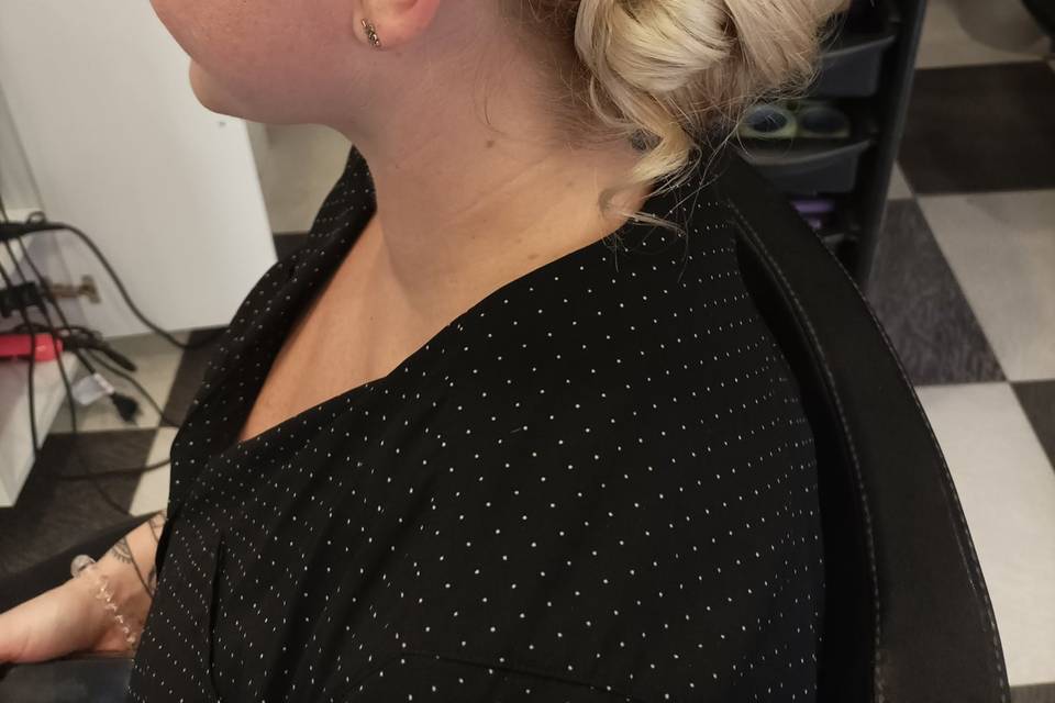 Chignon basso con trecce