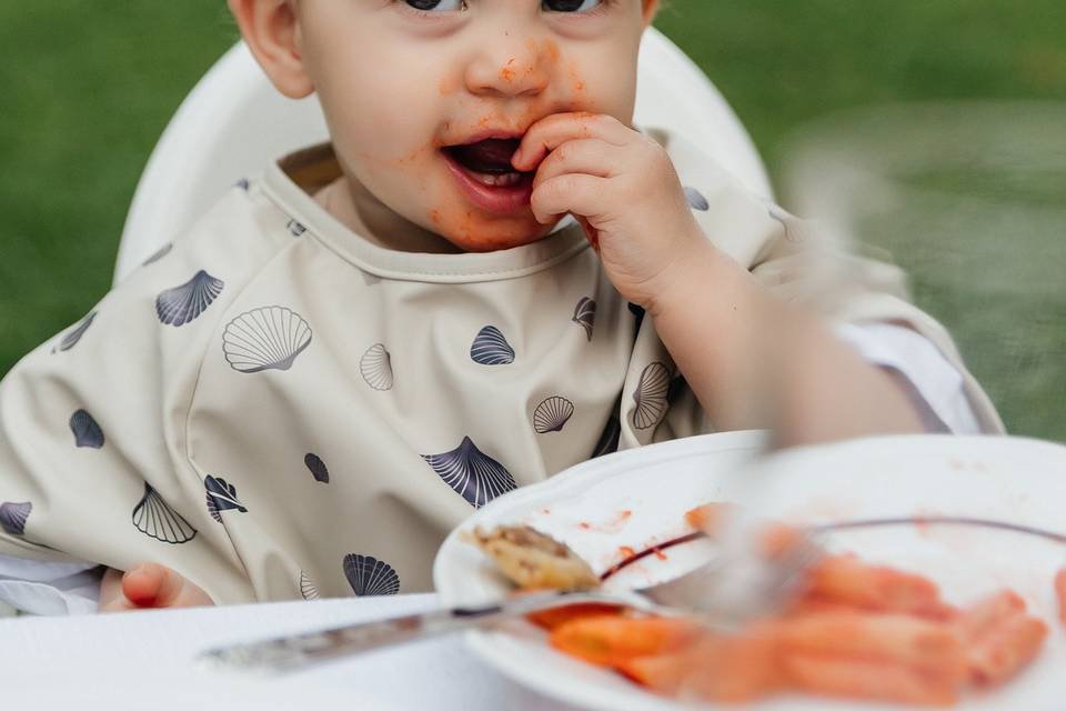Baby eating pasta