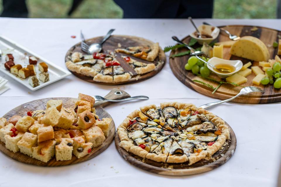 Pizze su tagliere legno buffet