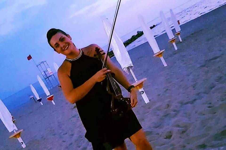 Violino in spiaggia