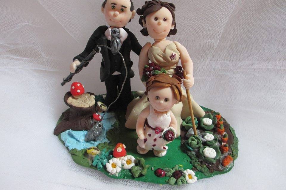 Cake topper bimba con cuscino