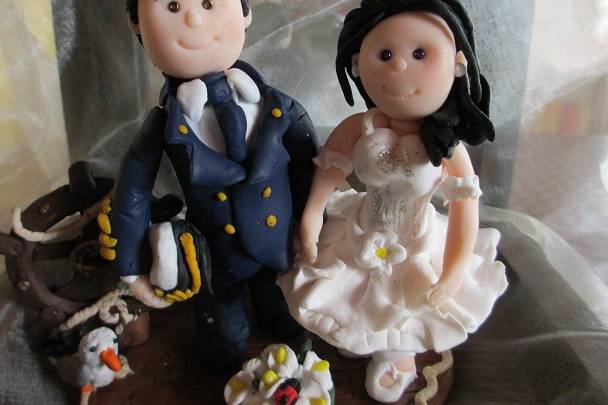 Cake topper bimba con fiori