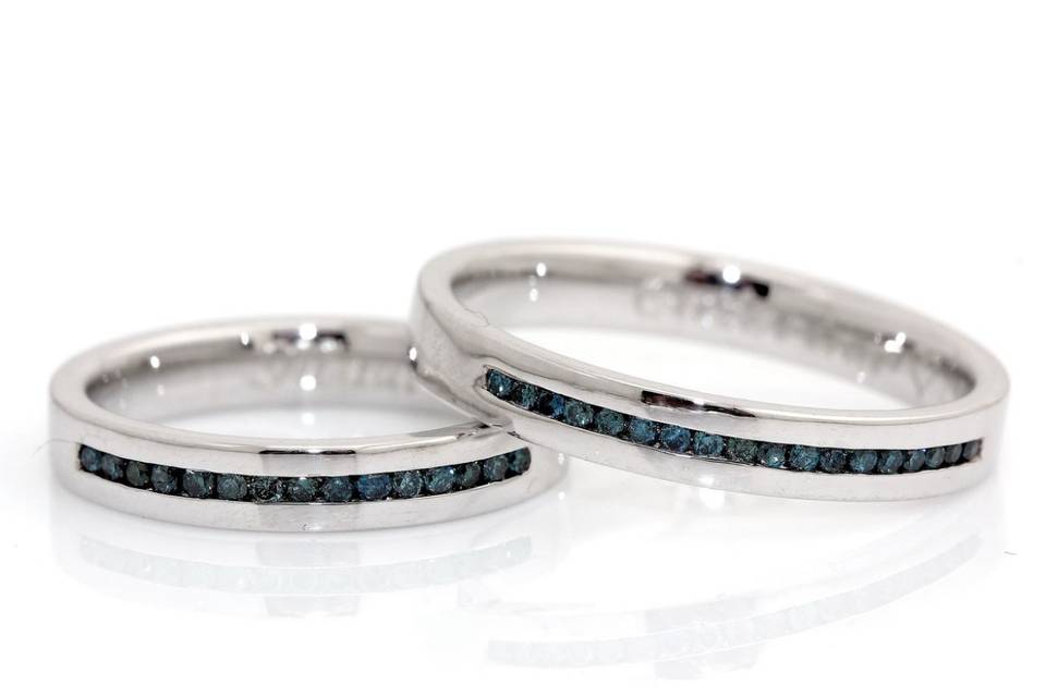 Fedi platino con diamanti blu