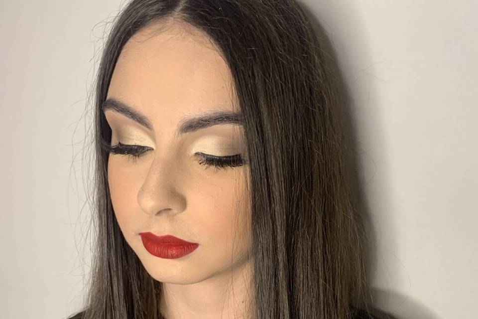 Cut Crease with red lips.