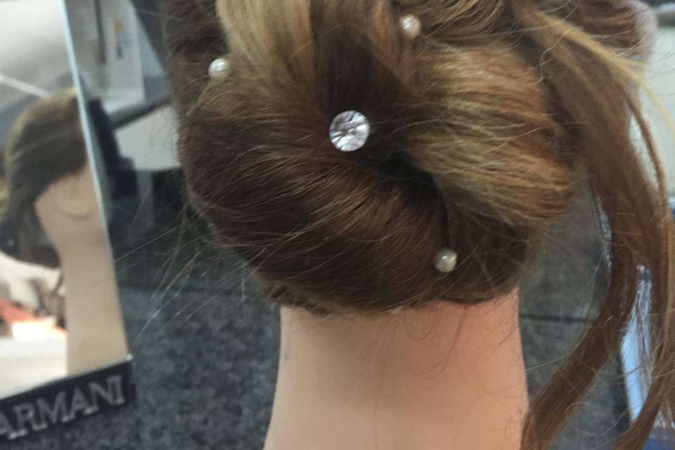 Chignon laterale elaborato