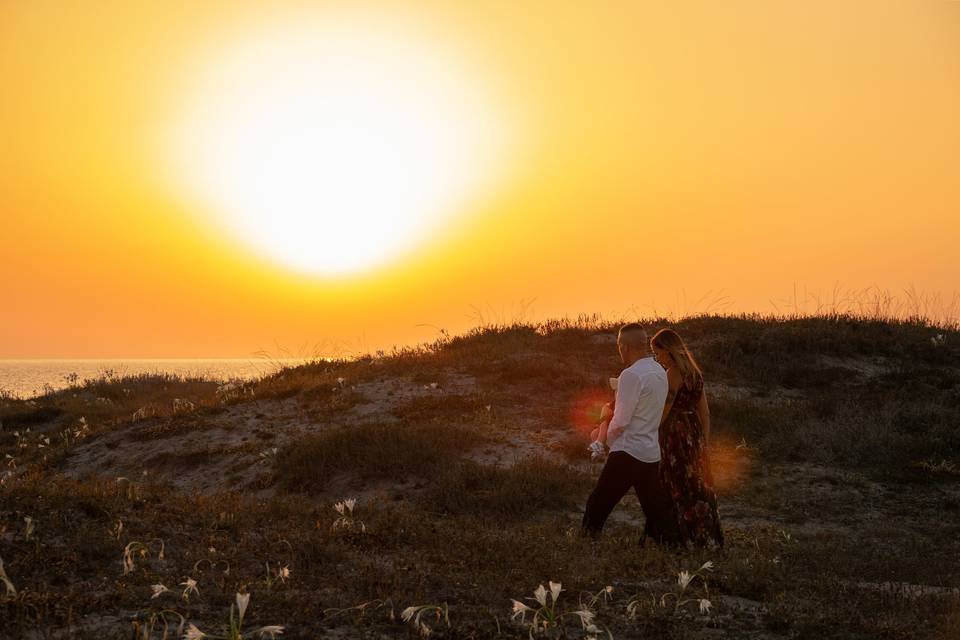 La famiglia fronte tramonto