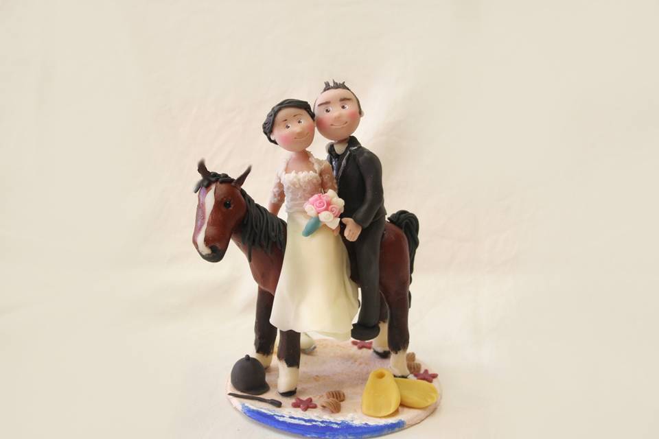 Cake topper sposi acavallo