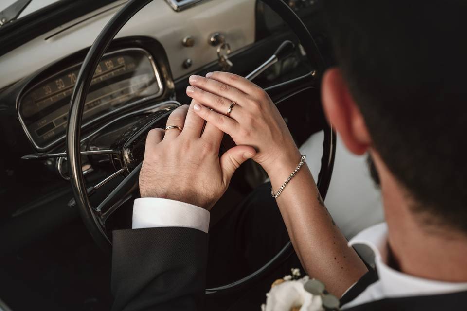 The hands of the bride and gro