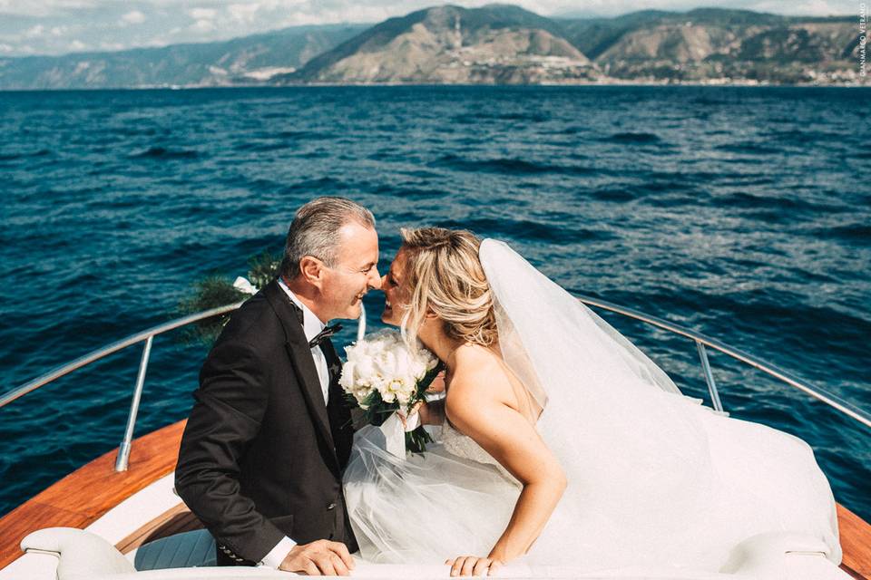 Sposa e papà in barca