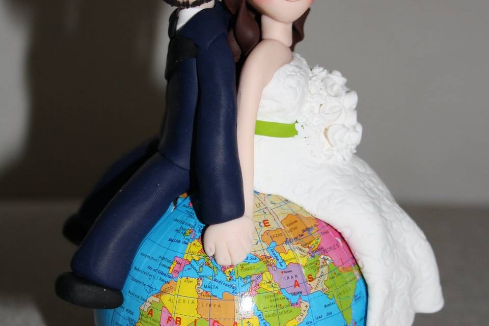 Cake topper con mappamondo