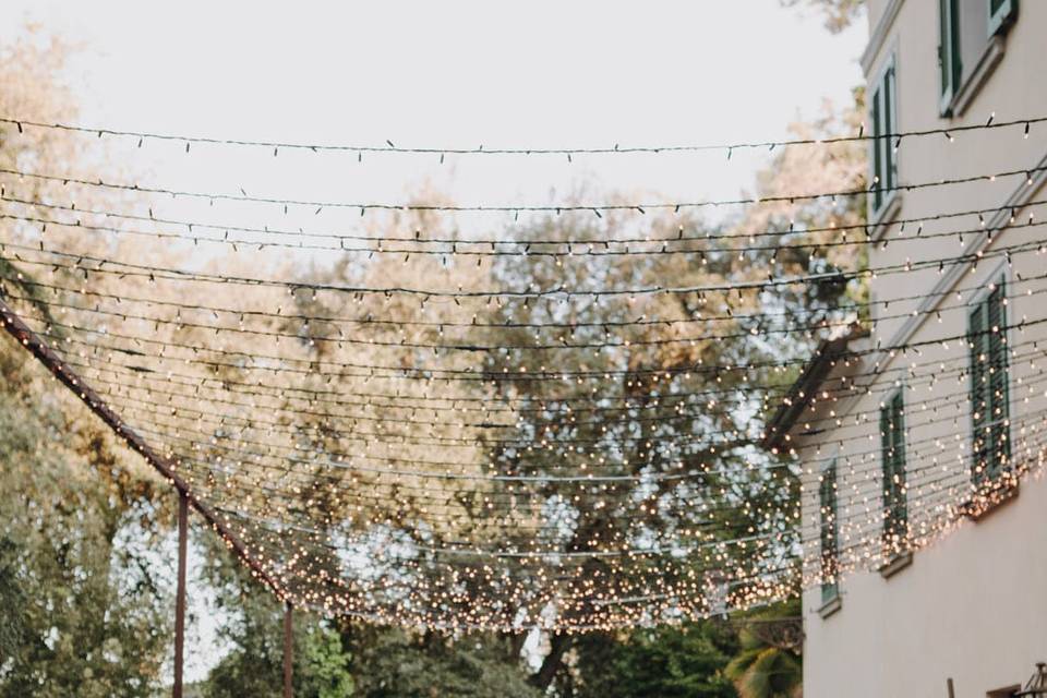 Fairy lights tunnel wedding