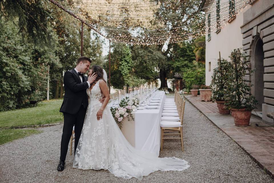 Fairy lights tunnel wedding
