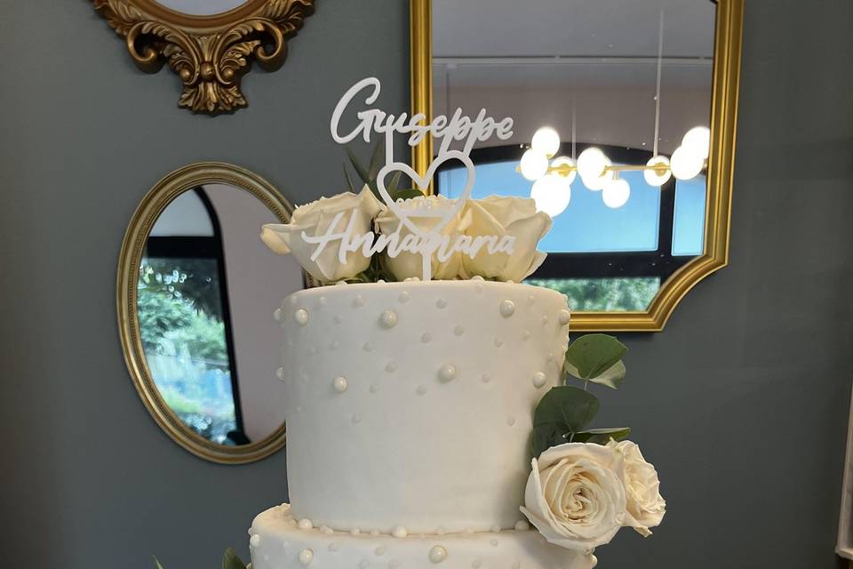 Zucchero,perle,fiocco e rose