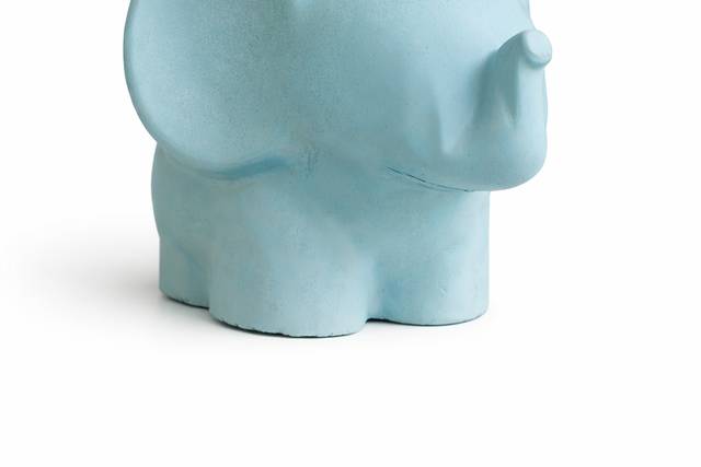 Elefante con candela o pianta
