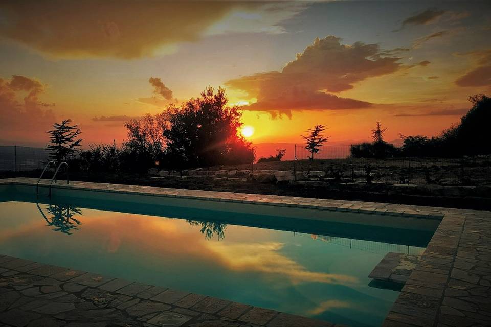 Piscina tramonto La Baita