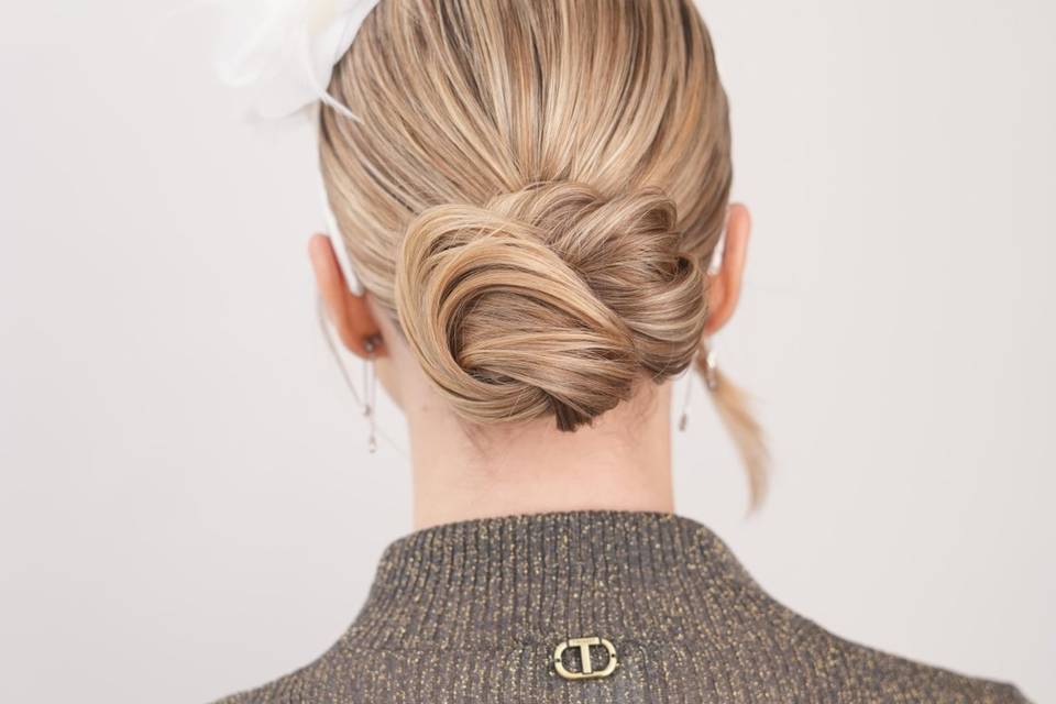 Sleek bun with accessories