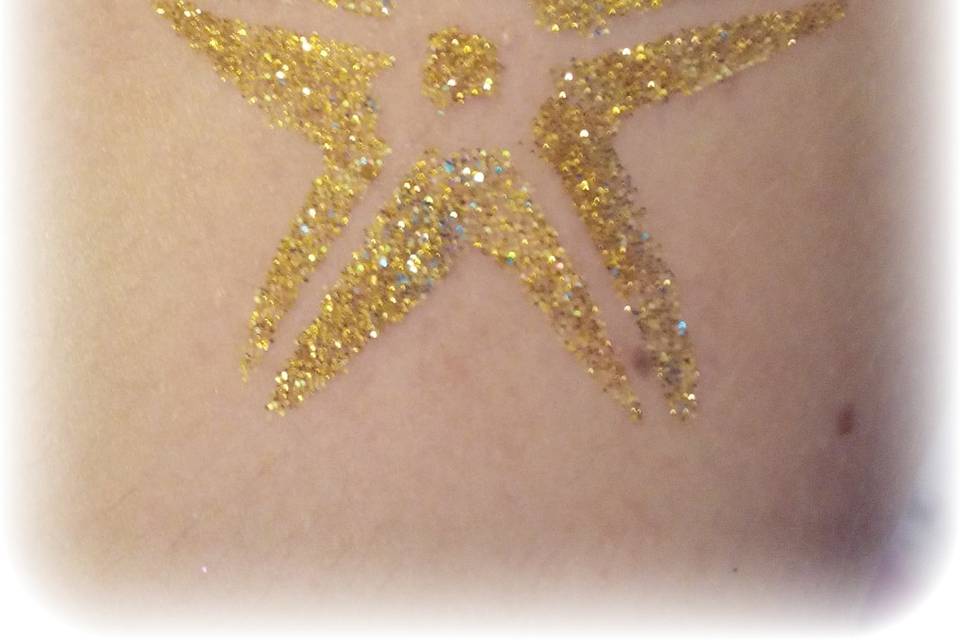 Tatuaggio glitter stella