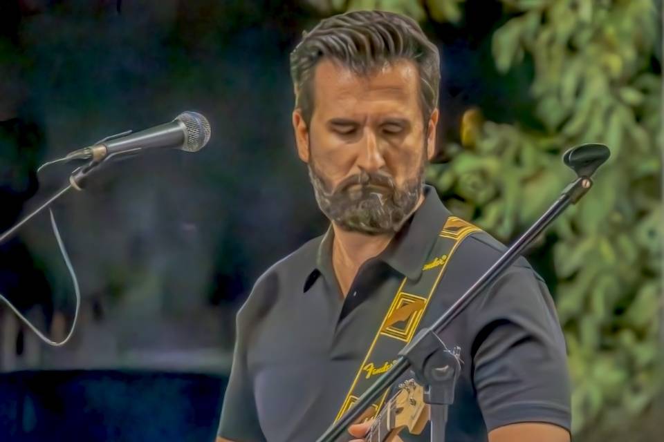 Luca: Guitars & Vocals