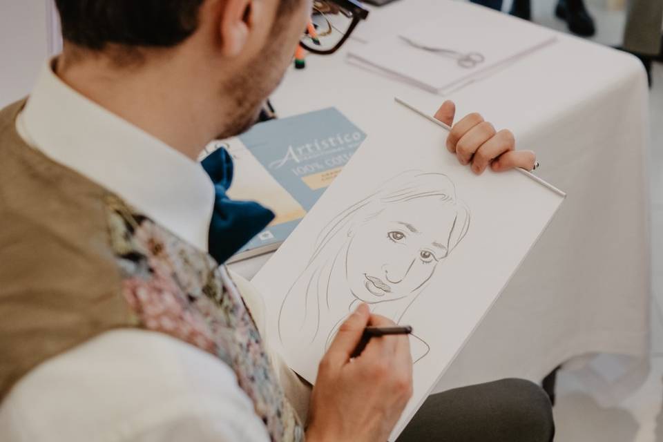 Artista-al-lavoro-caricatura