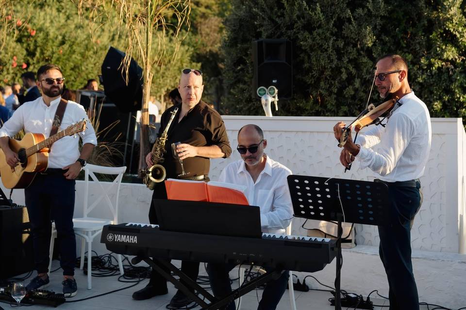 Piano sax violino e chitarra