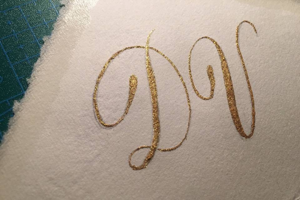 Calligrafia azzurro e oro