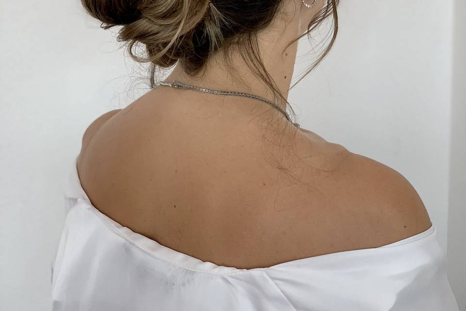 Chignon con trecce a spiga