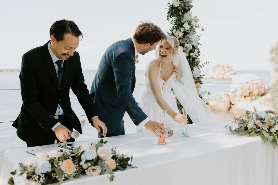 Sand ceremony by the sea.