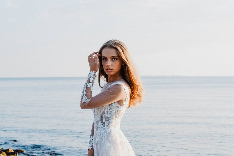 Bride in front of the sea