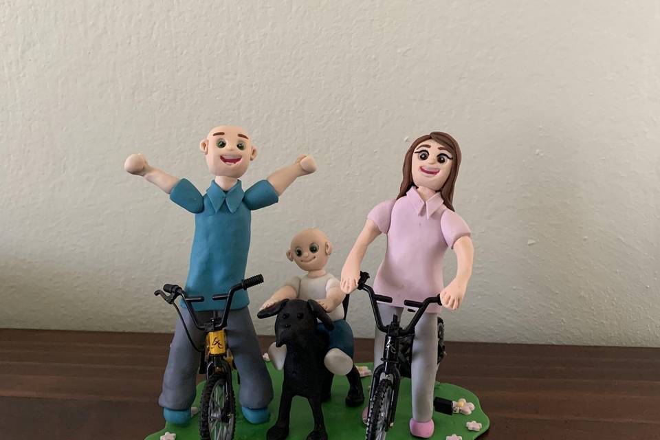 Cake topper famiglia su bici