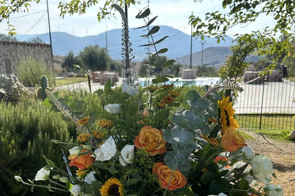 Girasoli e rose arancio