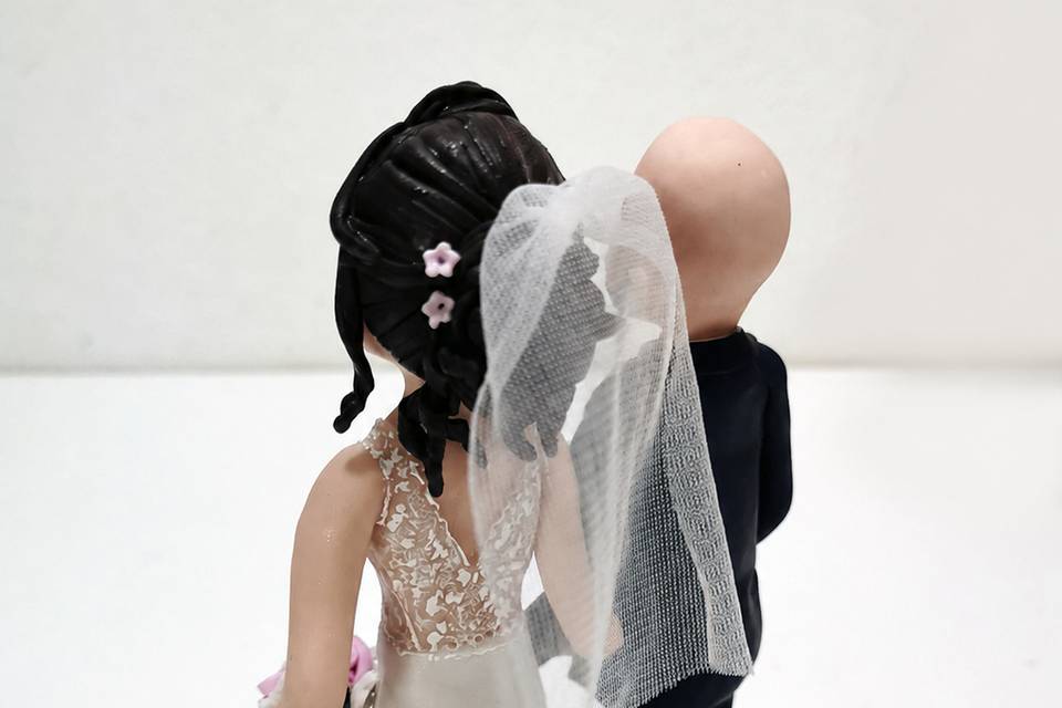 Topper dettagli abiti sposa